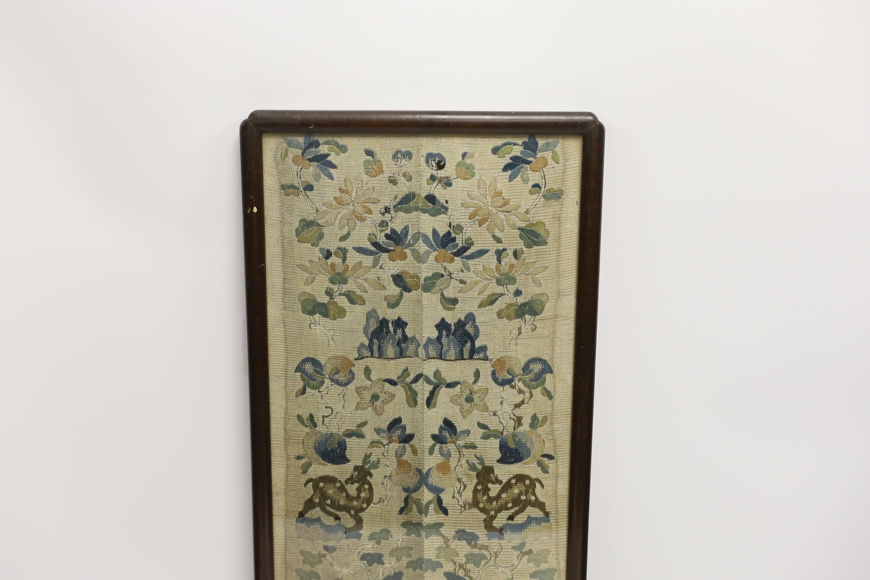 A framed pair of Chinese floral silk embroidered sleeve bands, embroidered with Chinese knot and stem stitch, 19cm wide x 50cm high